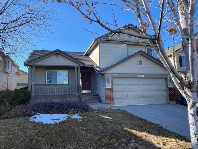 view of front of home with brick siding, a tiled roof, a porch, concrete driveway, and a garage