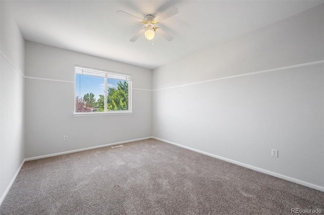 carpeted empty room with ceiling fan