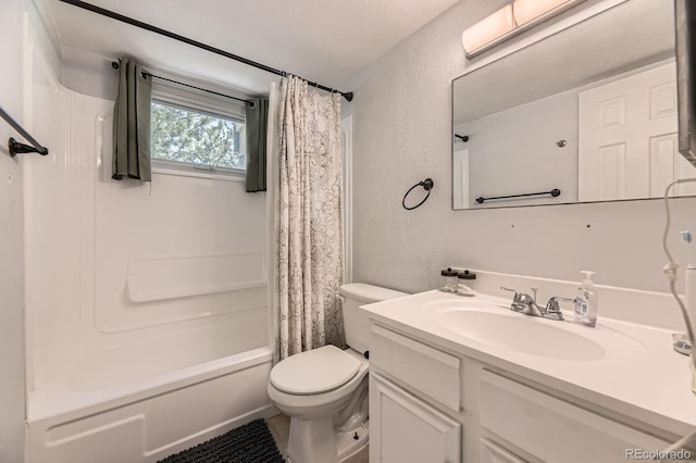 4653 S Lowell Blvd Unit E, Denver, CO 80236 - full bath featuring toilet, vanity, shower / bathtub combination with curtain, and a textured wall