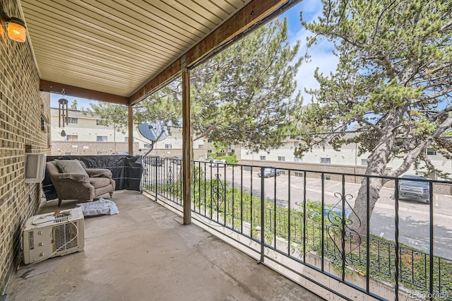 4653 S Lowell Blvd Unit E, Denver, CO 80236 - balcony featuring a cooling unit and a residential view