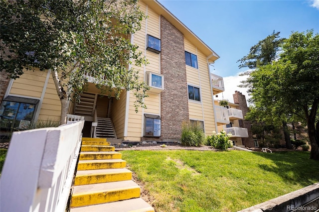 12506 E Cornell Ave Unit 102, Aurora, CO 80014 - view of property with stairway