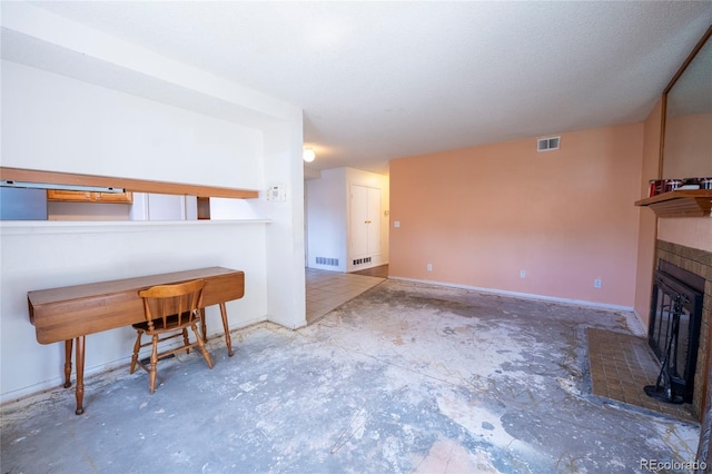 12506 E Cornell Ave Unit 102, Aurora, CO 80014 - unfurnished living room with a glass covered fireplace and baseboards