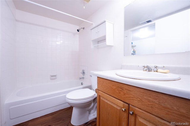 12506 E Cornell Ave Unit 102, Aurora, CO 80014 - bathroom featuring vanity, shower / tub combination, and wood finished floors