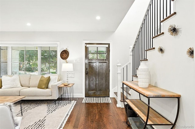 474 S Vine St, Denver, CO 80209 - foyer entrance with stairs, dark wood finished floors, and recessed lighting