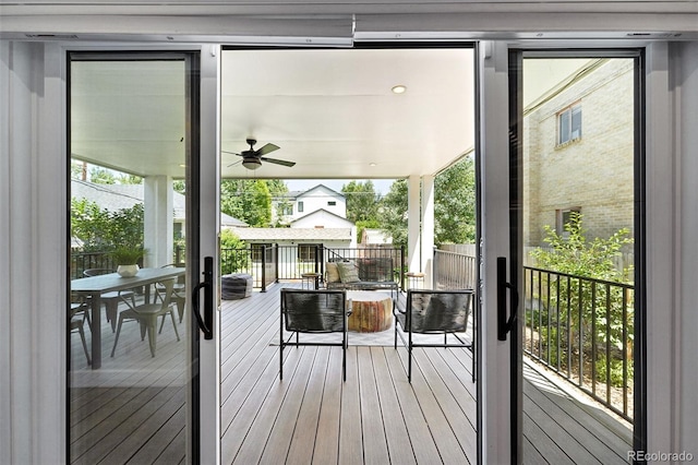 474 S Vine St, Denver, CO 80209 - doorway to outside featuring a ceiling fan and wood-type flooring