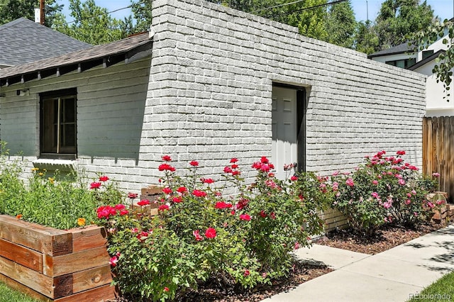 474 S Vine St, Denver, CO 80209 - view of home's exterior with roof with shingles