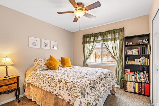 bedroom with ceiling fan and carpet flooring