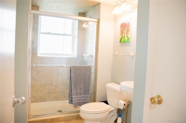 7961 Jared Way, Littleton, CO 80125 - bathroom with toilet and a stall shower