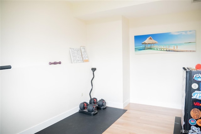 7961 Jared Way, Littleton, CO 80125 - exercise area with wood finished floors and baseboards