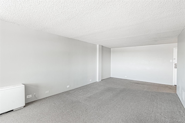 2225 Buchtel Blvd Unit 1005, Denver, CO 80210 - carpeted empty room featuring a textured ceiling