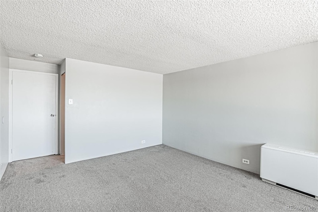 2225 Buchtel Blvd Unit 1005, Denver, CO 80210 - carpeted empty room featuring a textured ceiling