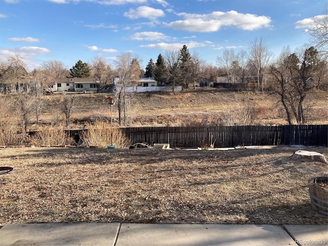 view of yard featuring fence