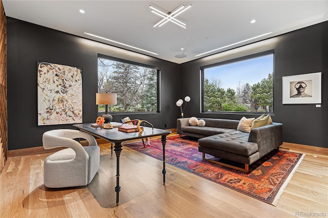 home theater featuring light wood-type flooring