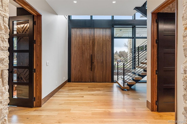 hall featuring light hardwood / wood-style floors