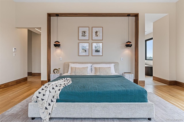 bedroom featuring hardwood / wood-style floors