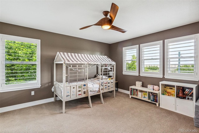 9244 E 37th Ave, Denver, CO 80238 - carpeted bedroom featuring baseboards and a ceiling fan