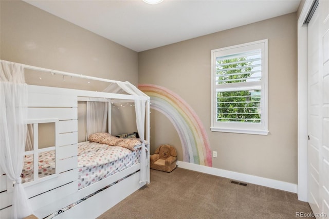 9244 E 37th Ave, Denver, CO 80238 - bedroom with carpet floors and baseboards