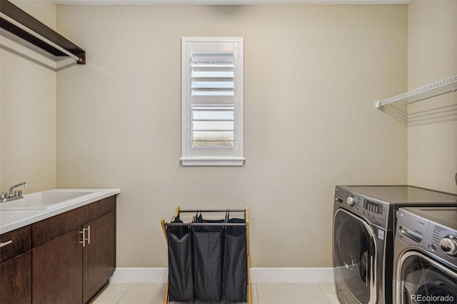 9244 E 37th Ave, Denver, CO 80238 - washroom with washer and clothes dryer and cabinet space