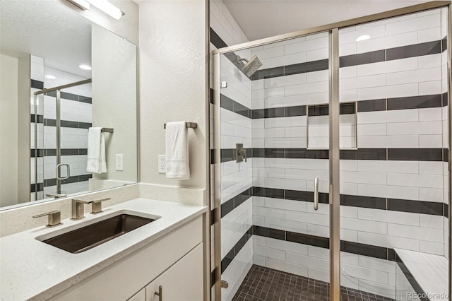 9244 E 37th Ave, Denver, CO 80238 - full bathroom featuring vanity, a stall shower, and recessed lighting