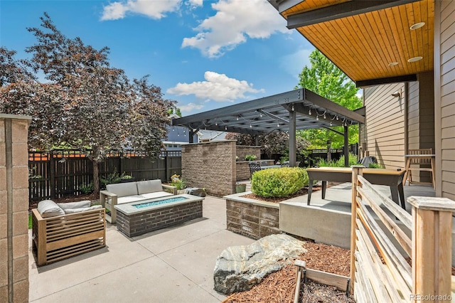 9244 E 37th Ave, Denver, CO 80238 - fenced backyard featuring an outdoor living space with a fire pit and a patio