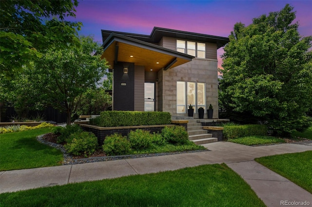 9244 E 37th Ave, Denver, CO 80238 - contemporary house with a front lawn