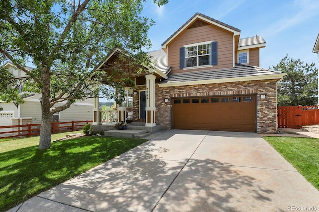 3912 Miners Candle Pl, Castle Rock, CO 80109 - view of front of property featuring brick siding, an attached garage, and driveway