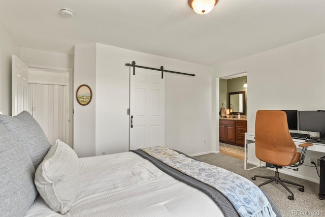 3912 Miners Candle Pl, Castle Rock, CO 80109 - carpeted bedroom with a barn door and ensuite bath