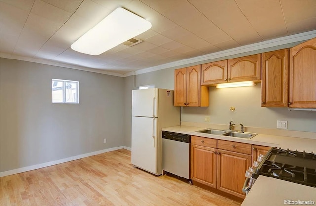 kitchen with ornamental molding, light hardwood / wood-style flooring, stainless steel dishwasher, and sink