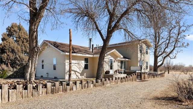 exterior space with a patio area and fence