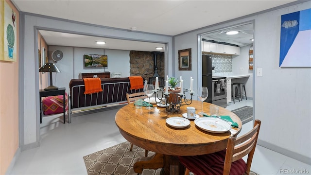 dining room with baseboards