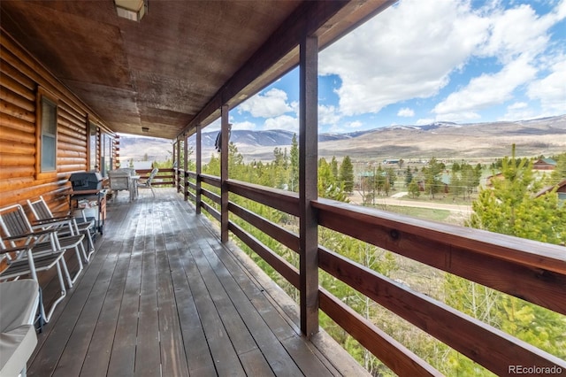 1295 Gcr 49, Grand Lake, CO 80447 - wooden terrace with a mountain view