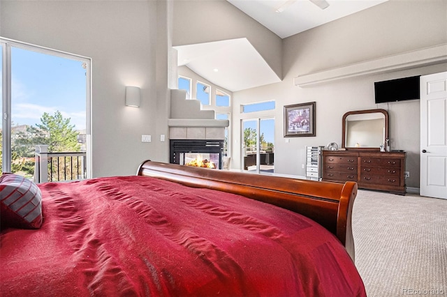 11065 W Rockland Dr, Littleton, CO 80127 - carpeted bedroom with access to outside, a fireplace, and high vaulted ceiling
