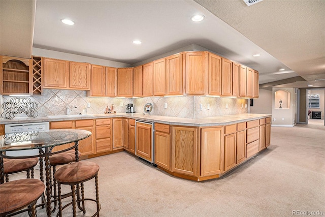 11065 W Rockland Dr, Littleton, CO 80127 - kitchen featuring light colored carpet, recessed lighting, a sink, light countertops, and open shelves