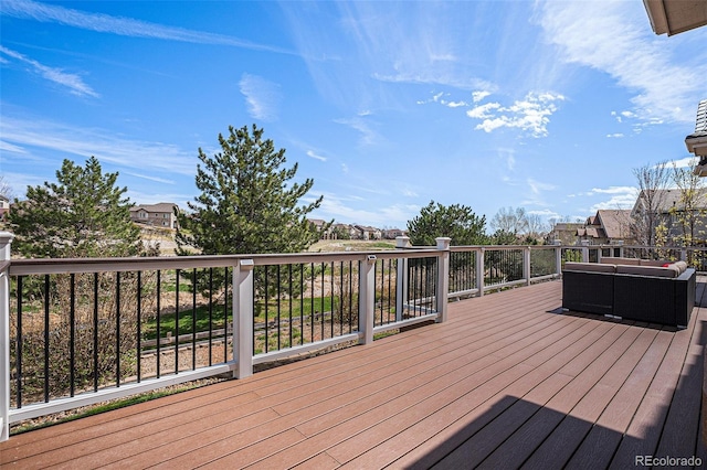 11065 W Rockland Dr, Littleton, CO 80127 - wooden terrace featuring outdoor lounge area