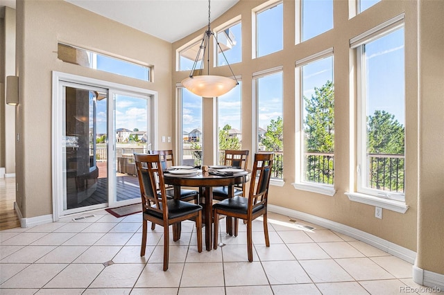 11065 W Rockland Dr, Littleton, CO 80127 - dining room with baseboards and light tile patterned flooring