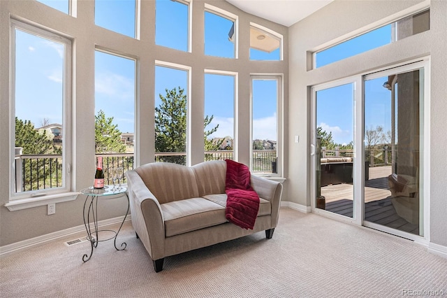 11065 W Rockland Dr, Littleton, CO 80127 - sunroom featuring healthy amount of natural light, carpet flooring, and baseboards