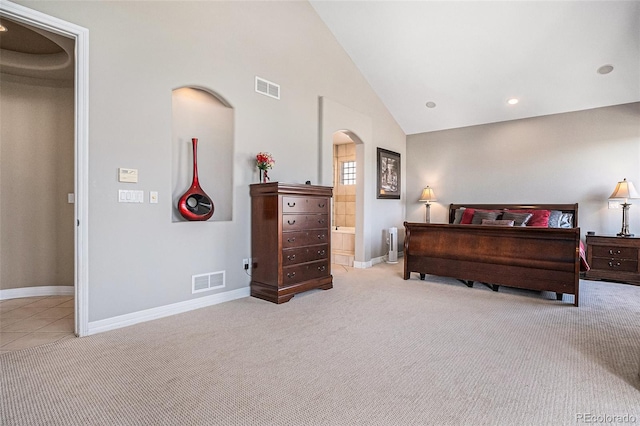11065 W Rockland Dr, Littleton, CO 80127 - tiled bedroom with arched walkways, carpet, baseboards, high vaulted ceiling, and recessed lighting