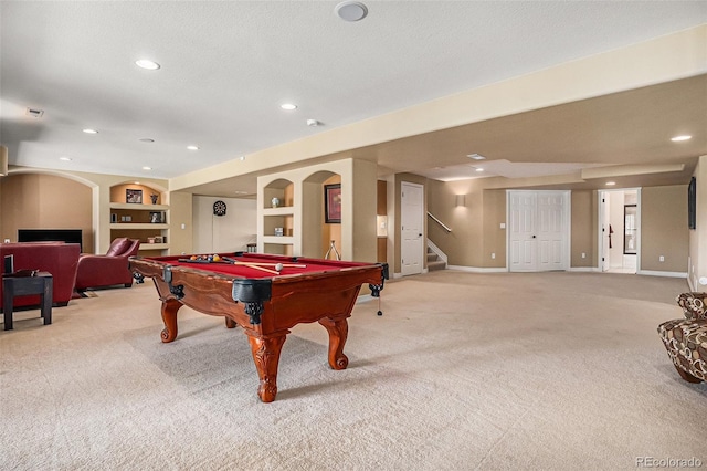 11065 W Rockland Dr, Littleton, CO 80127 - recreation room with light carpet, billiards table, built in features, baseboards, and recessed lighting