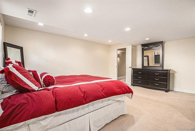 11065 W Rockland Dr, Littleton, CO 80127 - bedroom with light colored carpet, recessed lighting, baseboards, and a textured ceiling