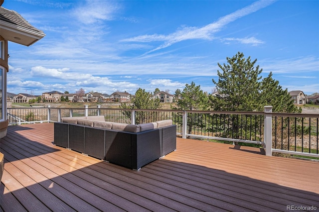 11065 W Rockland Dr, Littleton, CO 80127 - wooden terrace with an outdoor living space and a residential view