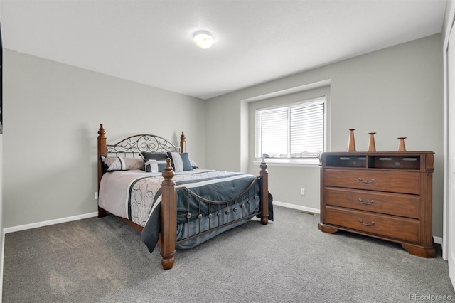 bedroom featuring baseboards, carpet flooring, and visible vents