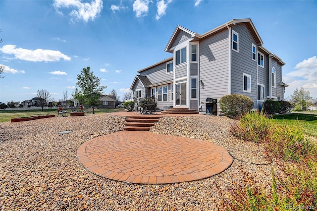 16680 Stroilway St, Hudson, CO 80642 - rear view of property featuring a patio and entry steps