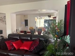 19939 Mitchell Cir, Denver, CO 80249 - living room with a chandelier