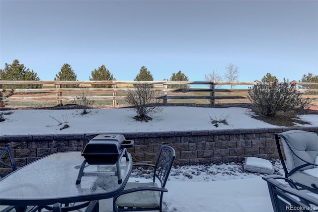 view of snow covered patio