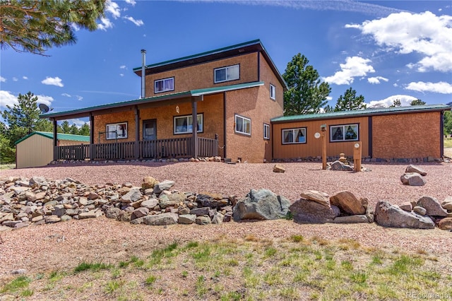 62 Rubel Cir, Westcliffe, CO 81252 - back of property featuring covered porch