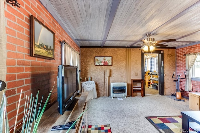 62 Rubel Cir, Westcliffe, CO 81252 - living area with heating unit, wood ceiling, carpet floors, ceiling fan, and brick wall