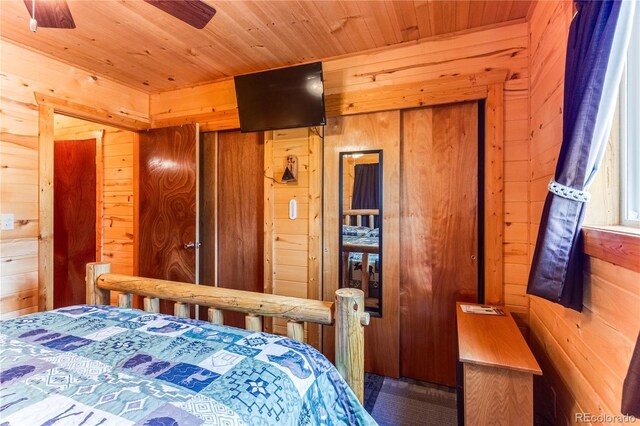 62 Rubel Cir, Westcliffe, CO 81252 - bedroom featuring wood walls and wood ceiling
