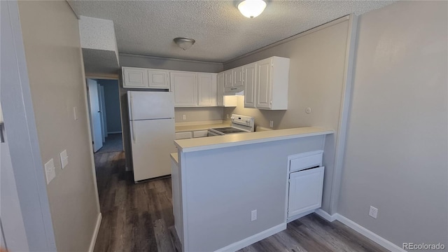 kitchen featuring white cabinets, kitchen peninsula, dark hardwood / wood-style floors, and white appliances