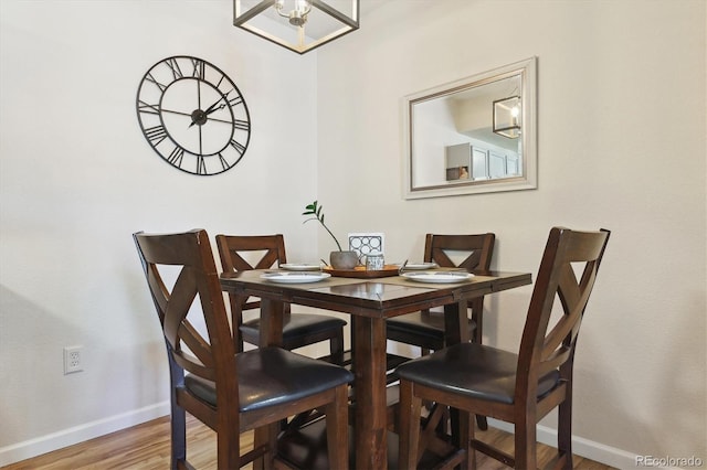 dining area featuring hardwood / wood-style flooring