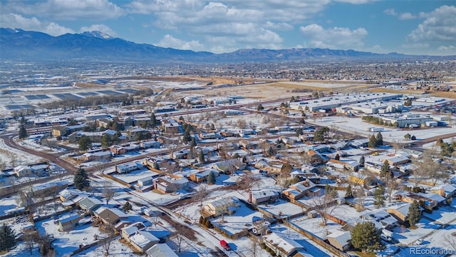 birds eye view of property with a mountain view